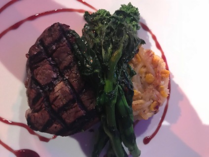 Steak, risotto and broccoli rabe.